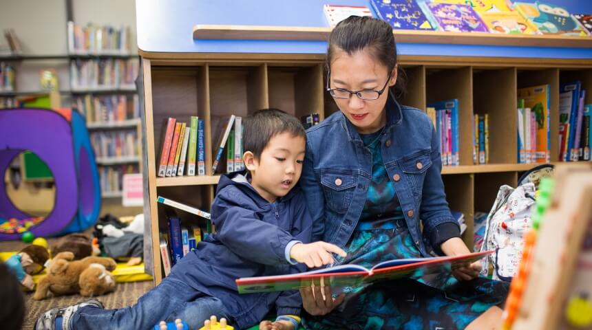 Parent reads book to child