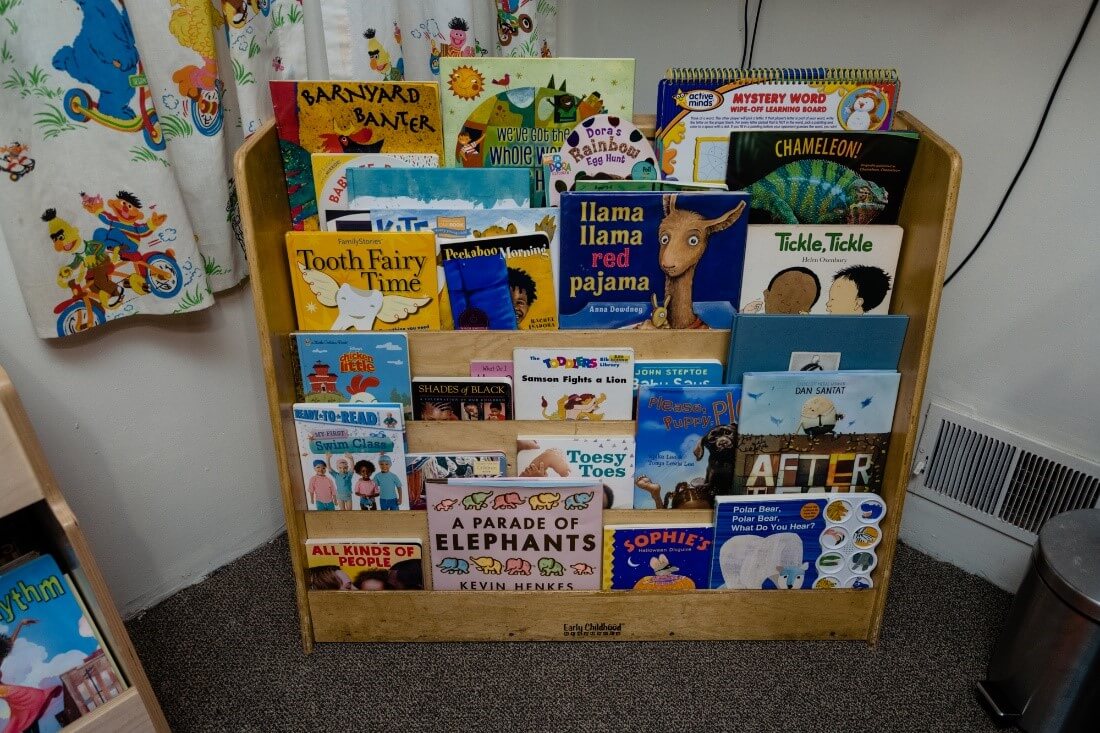 Books on display in a daycare classroom.