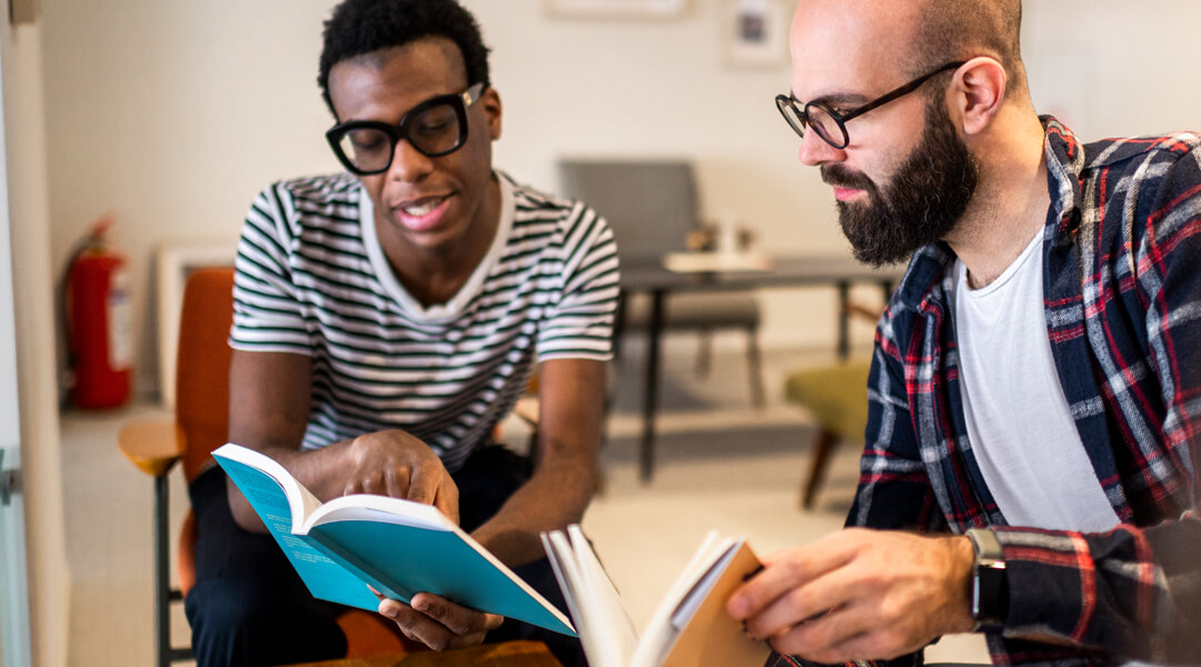 Two Adults Compare Books