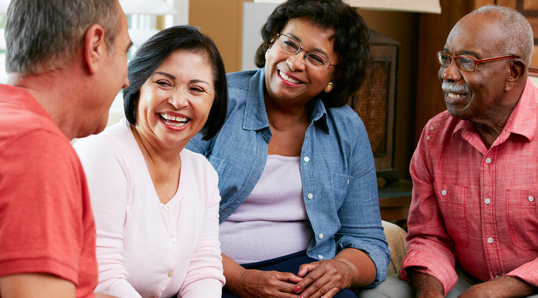 Group of adult friends in conversation