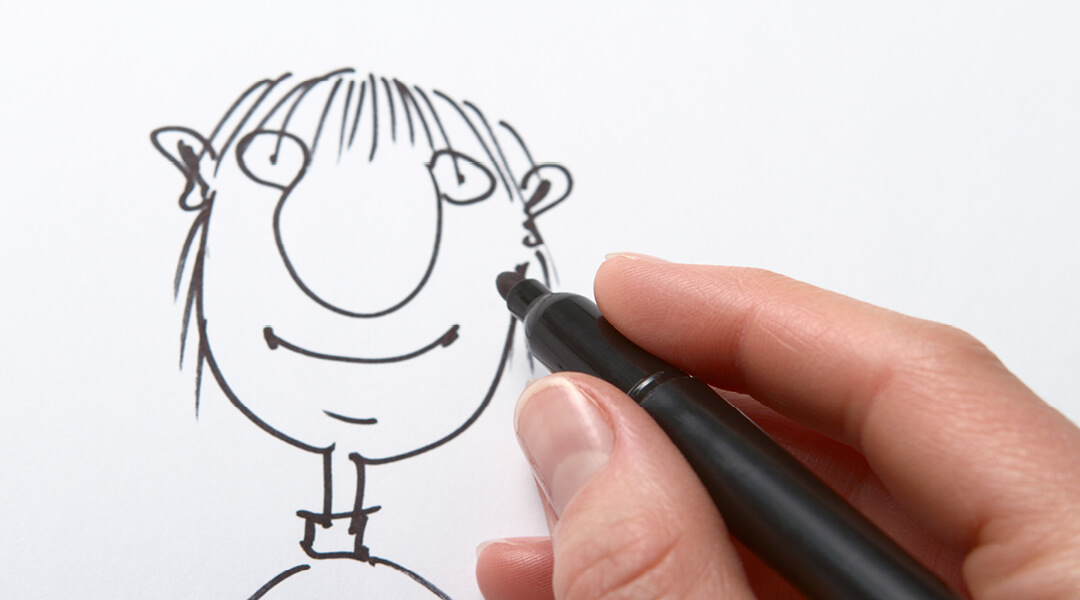 Close-cropped image of a hand holding a black felt-tipped pen doodling a person on a white background.