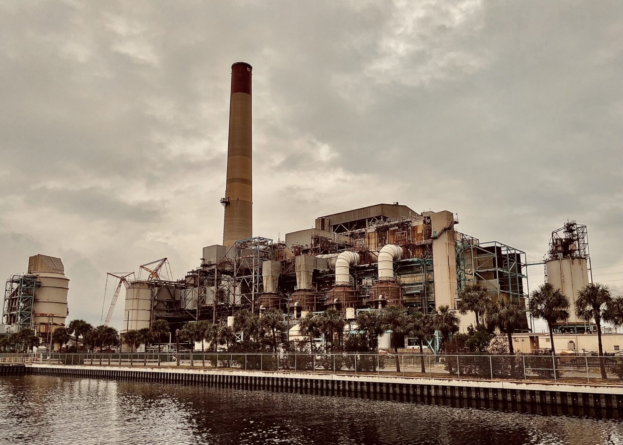An industrial plant along the riverfront.