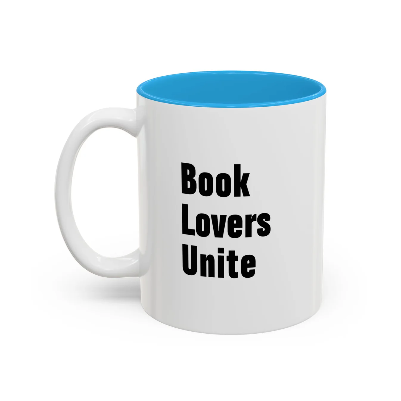 A white mug with text that says "Book Lovers Unite"