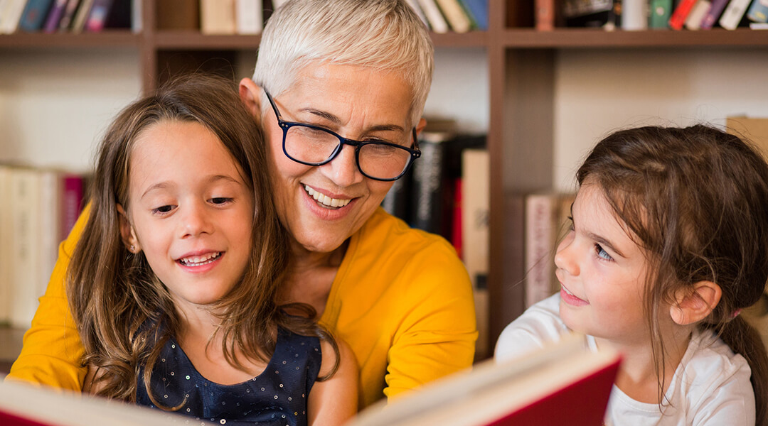 A grandmother and her children enjoying Carnegie Library of Pittsburgh