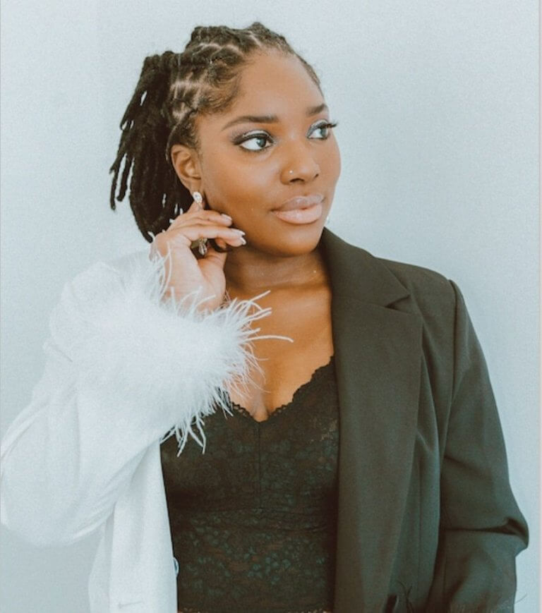 Photo of woman with stylish hair and clothing