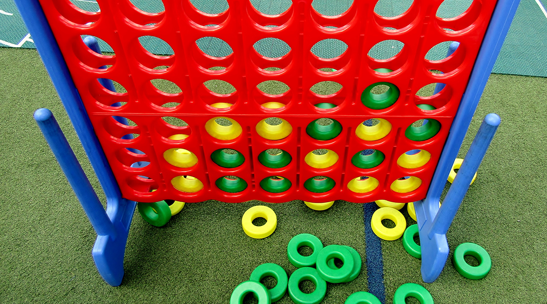A large, yard version, of the board game: Connect Four.