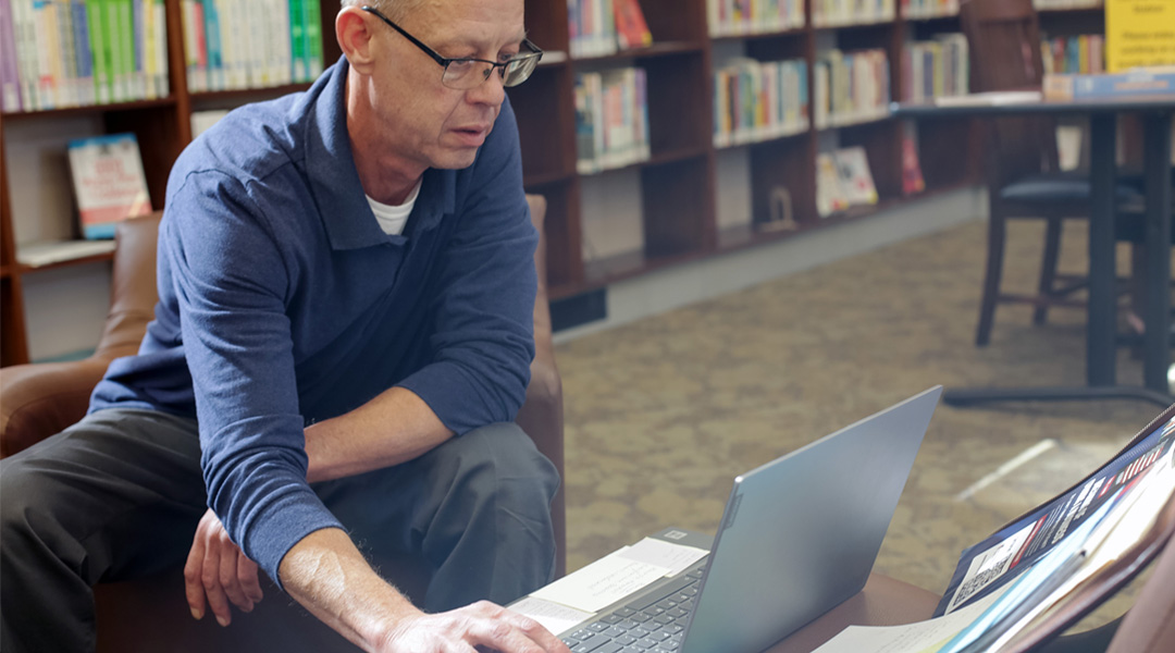 John Bower, a library patron, researches job opportunities at the library.