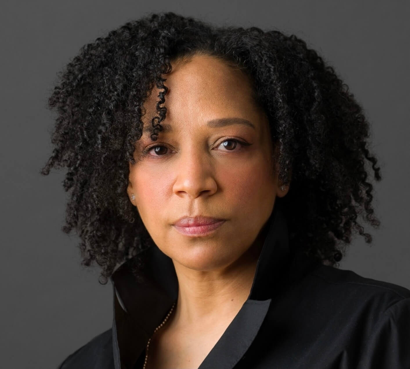 Photo of woman with a serious expression
