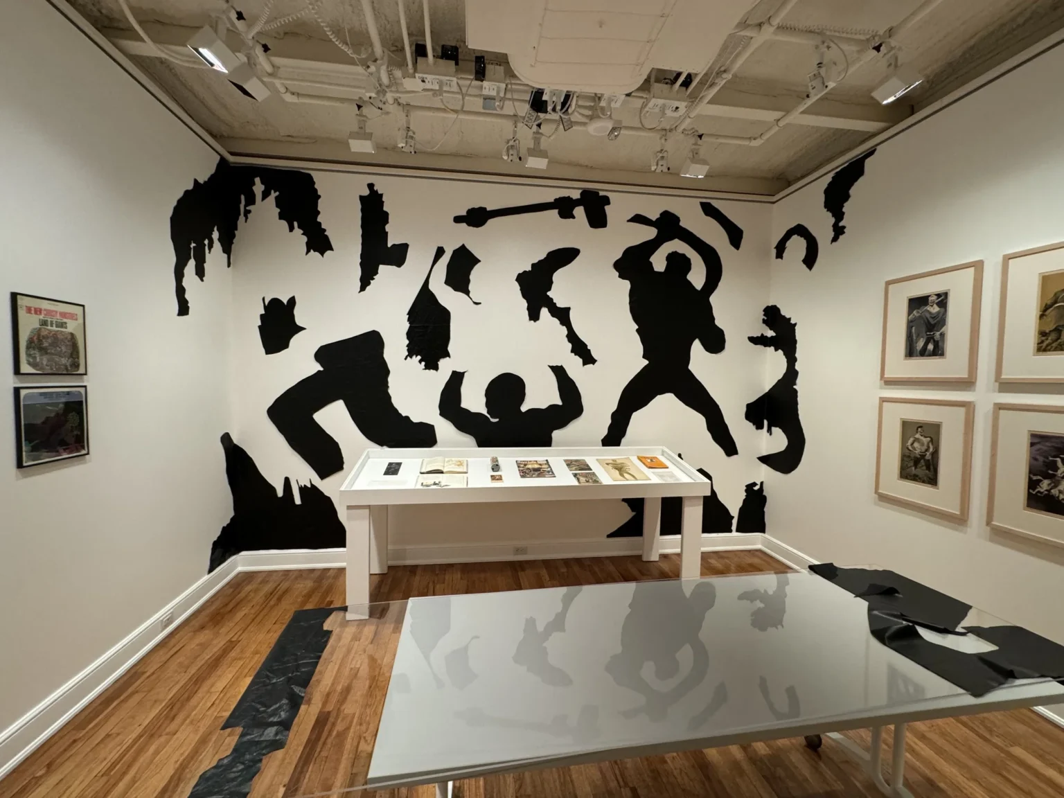 Quaishawn Whitlock artwork - shadow portraits on a wall