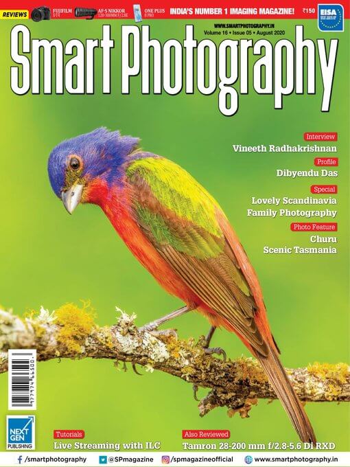 Cover of the magazine "Smart Photography" shows a photo of a purple, green and red bird perched on a mossy branch.