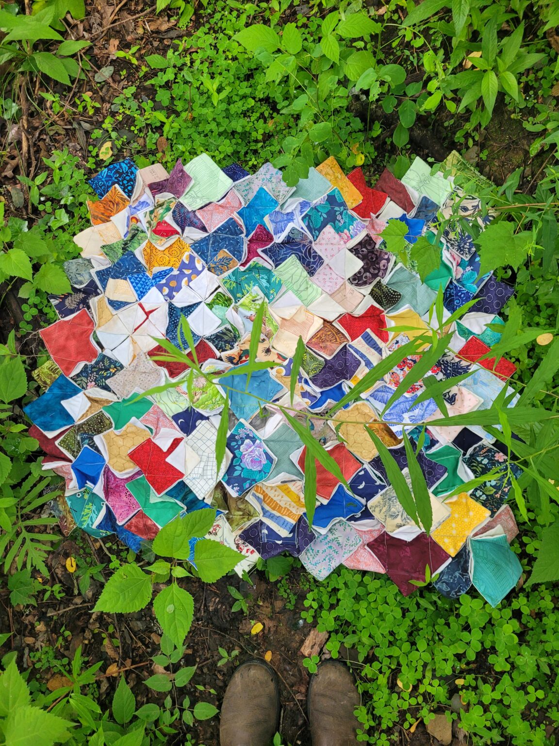 Artwork by Vic Spindler Fox - quilt on the ground